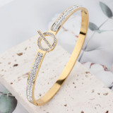Brazalete de diamantes de imitación con incrustaciones de acero de titanio geométrico elegante
