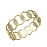 El chapado de acero inoxidable ovalado del estilo simple elegante ahueca hacia fuera el brazalete plateado oro del Zircon del embutido