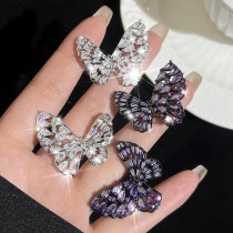 1 par de pendientes de diamantes de imitación de cobre con incrustaciones huecas chapados en mariposa brillante estilo IG