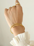 Brazalete chapado en oro de 18K con revestimiento de acero inoxidable de color sólido de estilo simple al por mayor