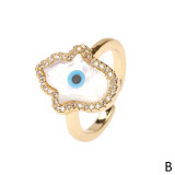 Anillo de concha creativo de cobre con circonita ojo del diablo, moda europea y americana, joyería al por mayor