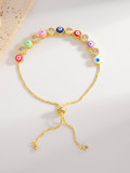 Pulseras chapadas en oro de 18 quilates con incrustaciones de cristal chapado en esmalte de cobre y palma de ojo de diablo cruzado de estilo Simple IG