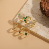Anillos chapados en oro de 14K con incrustaciones de circonio asimétrico de cobre con gotas de agua de estrella cuadrada de estilo clásico elegante