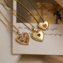 Collar con colgante chapado en oro de 18 quilates con incrustaciones de cobre y forma de corazón de viaje de estilo simple
