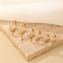 1 par de pendientes chapados en oro con incrustaciones de circonita de cobre y estilo sencillo e informal
