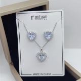 Conjunto de joyería para mujer con incrustaciones de circonio chapado en acero titanio en forma de corazón de moda de 2 piezas