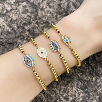 Pulsera de ojo de diablo de circón con microincrustaciones Simple europea y americana, pulsera de tracción ajustable con cuentas de cobre doradas tejidas Brd69