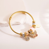 Brazalete chapado en oro de diamantes de imitación con incrustaciones de acero de titanio de aleación de mariposa dulce elegante