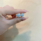 1 par de pendientes chapados en oro blanco con incrustaciones de cobre y circonita redonda brillante y dulce informal