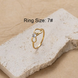 Anillos chapados en oro de 18K con diamantes de imitación ahuecados chapados en acero inoxidable con mariposa de amor estilo IG