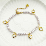 Pulseras chapadas en oro con incrustaciones de diamantes artificiales de acero inoxidable con forma de corazón romántico elegante