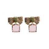 1 par de pendientes colgantes de cristal con perlas artificiales de cobre con incrustaciones de nudo de lazo agradable
