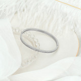 Brazalete de diamante artificial con incrustaciones de pulido de acero de titanio de color sólido elegante de Streetwear