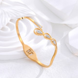 Venta al por mayor estilo clásico gotas de agua forma de corazón mariposa titanio acero 24K chapado en oro brazalete de circón