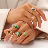Anillos abiertos de color turquesa con incrustaciones de acero inoxidable y flores de estilo moderno