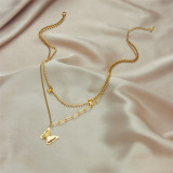 Collares de doble capa chapados en oro de 18 quilates con revestimiento de acero de titanio y mariposa de estilo simple