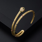 Pulsera con forma de serpiente de circonita con incrustaciones de oro real chapada en cobre exagerada