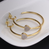 1 par de pendientes chapados en oro con incrustaciones de circonita de cobre y forma de corazón de estilo Simple estilo IG