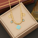 Collar elegante de los pendientes de las pulseras de la turquesa del embutido de la galjanoplastia del acero inoxidable de la flor