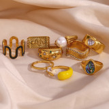 El oro simple del acero inoxidable 18K del color sólido del estilo plateó los anillos del Zircon de la perla a granel