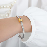 Brazalete de circón con incrustaciones de acero y titanio de color sólido de estilo simple