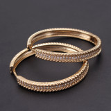 1 par de pendientes chapados en oro con incrustaciones de cobre y circonita de Color sólido de estilo clásico para mujer