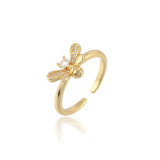 Anillo dividido de abeja de circonita con microincrustaciones de cobre simple