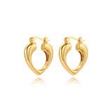 1 par de pendientes retro chapados en oro de 18 quilates con forma de corazón y forma de U para mujer