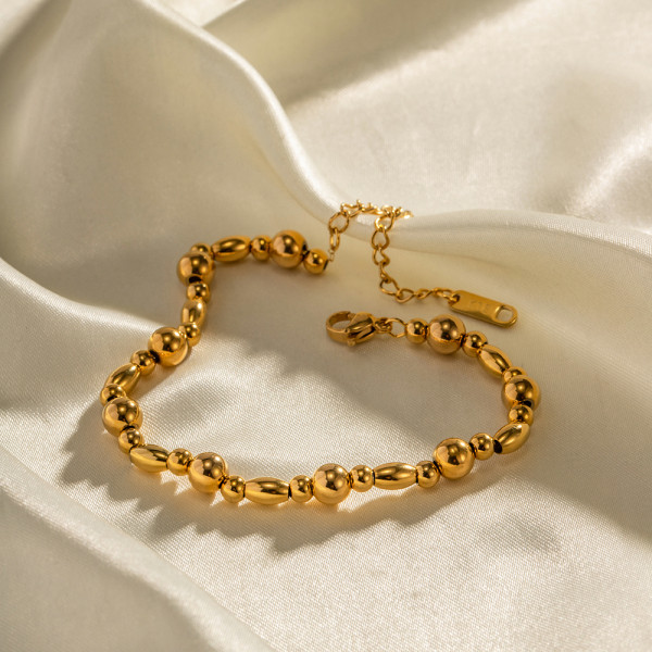 Elegantes pulseras redondas chapadas en oro de 18 quilates con revestimiento de acero inoxidable