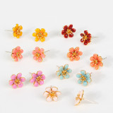 Pendientes tipo botón con revestimiento de cobre y flor de estilo simple, 1 par