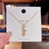 Collar con colgante chapado en oro con incrustaciones de acero y titanio, oso estrella, estilo de dibujos animados