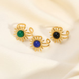 Anillos abiertos de color turquesa con incrustaciones de acero inoxidable y flores de estilo moderno