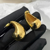 1 par de aretes de cobre chapados en ondas de estilo simple