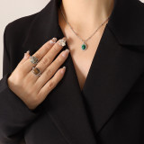 Conjunto de collar y pendientes de acero de titanio con colgante de ópalo turquesa de moda
