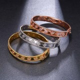 Brazalete elegante de circón con incrustaciones de cobre y trébol de cuatro hojas para mujer