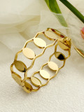 El chapado de acero inoxidable ovalado del estilo simple elegante ahueca hacia fuera el brazalete plateado oro del Zircon del embutido