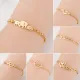 Pulseras con revestimiento de acero de titanio y mariposa dulce