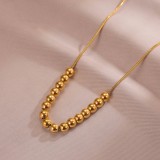 Collar chapado en oro clásico con revestimiento de acero y titanio Lady Ball