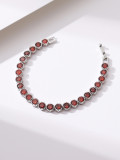 Pulseras elegantes de circón con incrustaciones de cobre redondas para dama