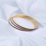 Brazalete de diamantes de imitación chapado en oro con incrustaciones de acero inoxidable de Color sólido geométrico de estilo clásico informal al por mayor