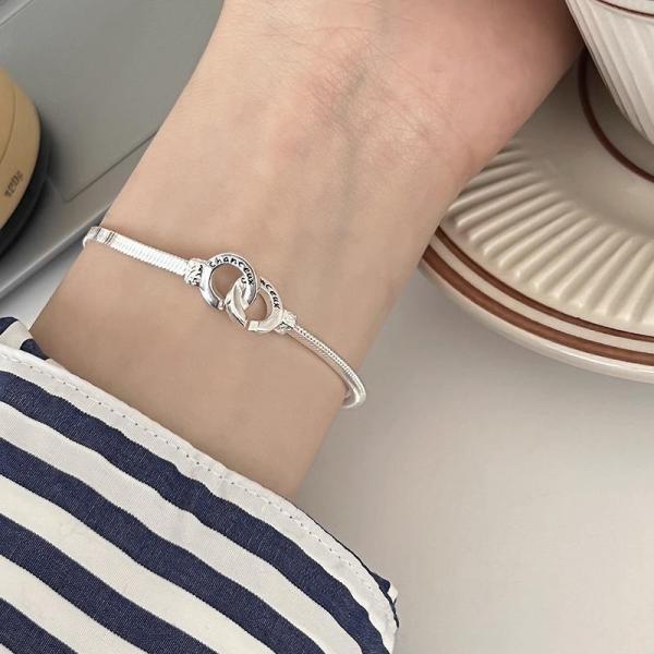 Pulseras de chapado en cobre con doble anillo para mujer