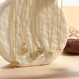 Elegante collar con colgante de circonio chapado en oro de 14 quilates con forma de corazón y letra MAMA a granel