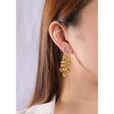 1 par de pendientes colgantes de circonita de cobre con incrustaciones de borlas glamorosas