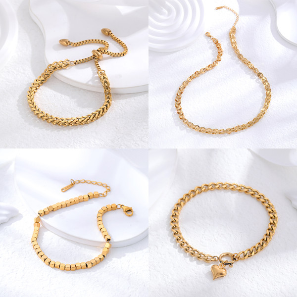 Pulseras plateadas oro titanio de acero 24K del color sólido retro al por mayor de la forma del corazón