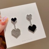 Pendientes de diamantes de imitación con incrustaciones de cobre con nudo de lazo en forma de corazón dulce 1 par