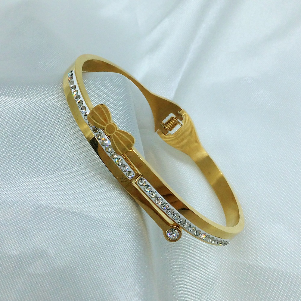 Brazalete de circón con incrustaciones de acero de titanio y nudo de lazo de estilo simple y clásico