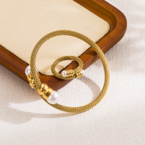 Conjunto de joyería chapado en oro de 18 quilates con incrustaciones de acero inoxidable redondo elegante