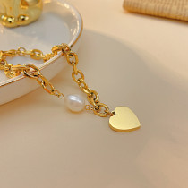 Pulseras de perlas de acero titanio con forma de corazón de estilo simple y elegante