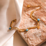 Venta al por mayor de pulseras de turquesa chapadas en oro de 18 quilates con incrustaciones de acero de titanio y hojas de estrella de viaje de estilo Simple