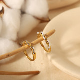 Anillos chapados en oro de 18 quilates con circonita de perlas con incrustaciones de acero inoxidable torcido de estilo simple y clásico